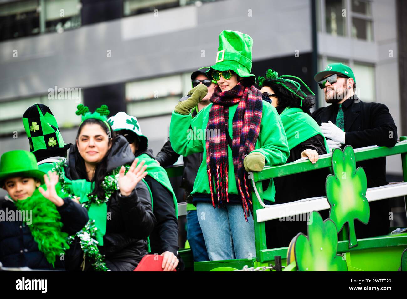 Montreal, Canada - March 17 2024： People celebrating the Saint Patrick`s Day Parade in Montreal downtown Stock Photo